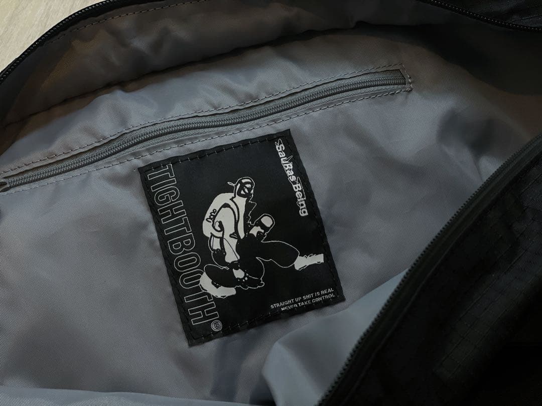 バッグ TIGHTBOOTH x SauRas Being MESSENGER BAG